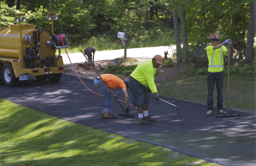 The driveway is now sealed.  One job I'm VERY happy to have had professionals do...  