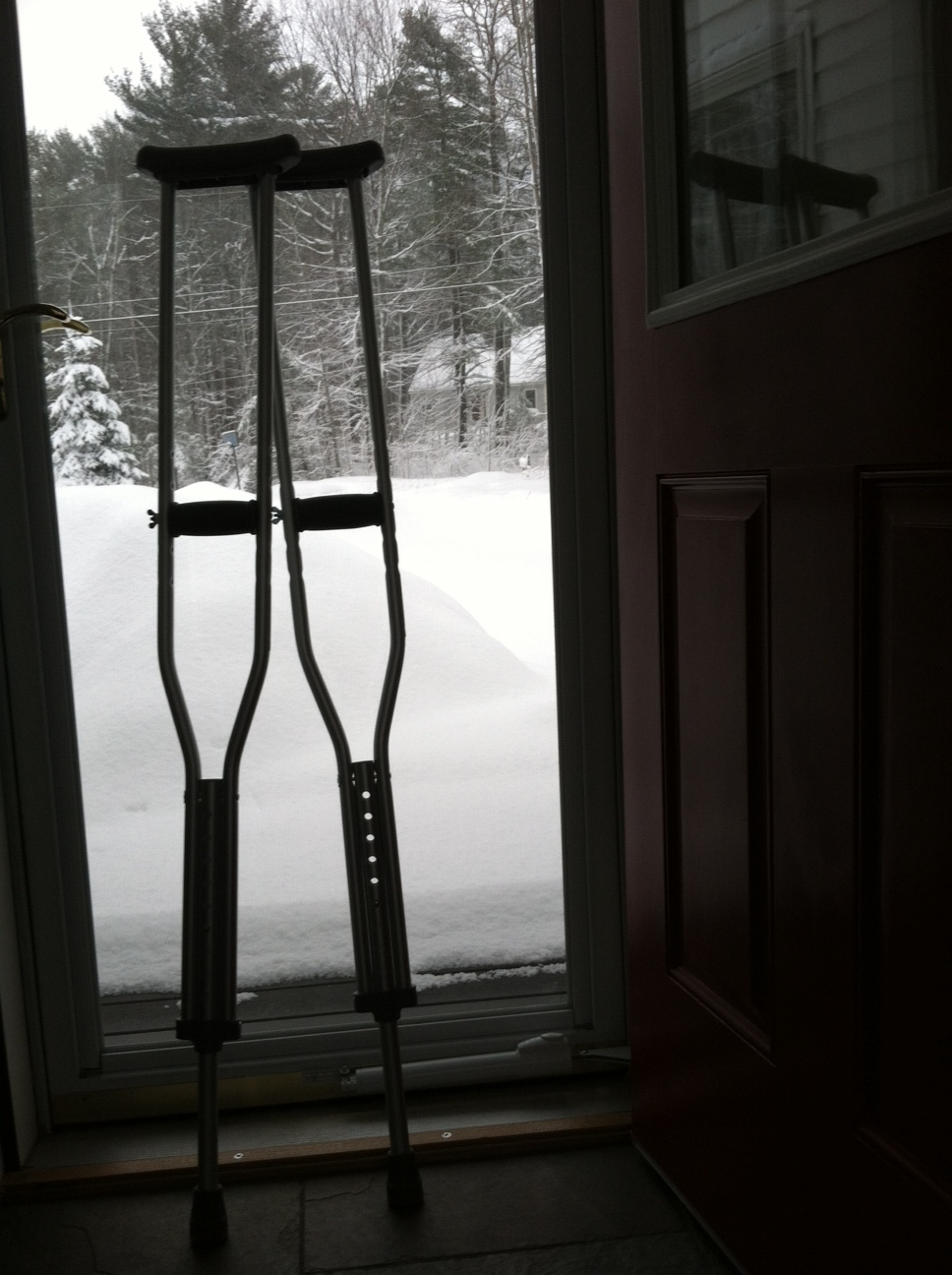 The crutches win...no driveway clearing for me :(   Extremely thankful for a neighbor friend with a plow.