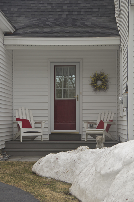 Snow piles be damned... the front porch chairs are out of winter storage.