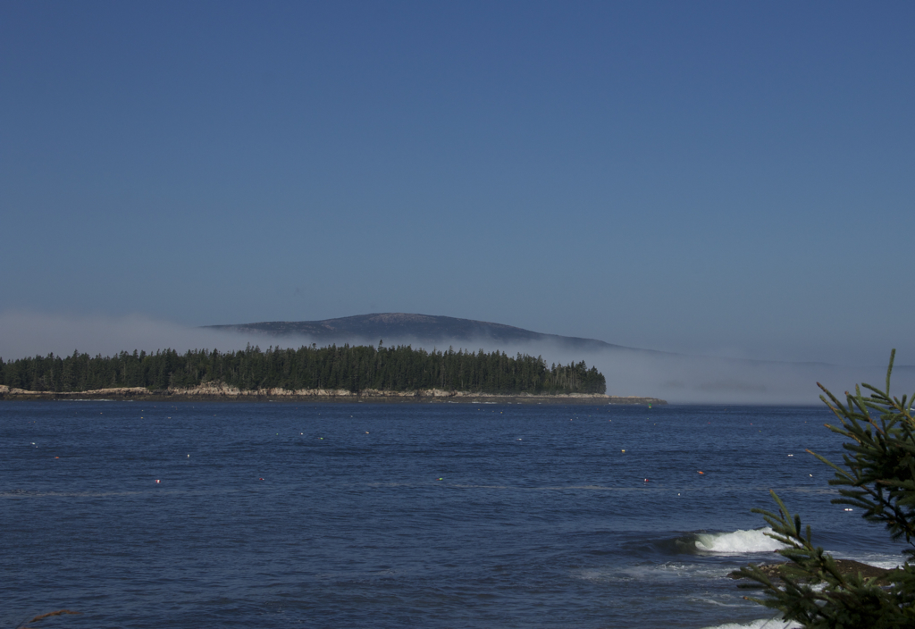 Fog lifting over the mountain...