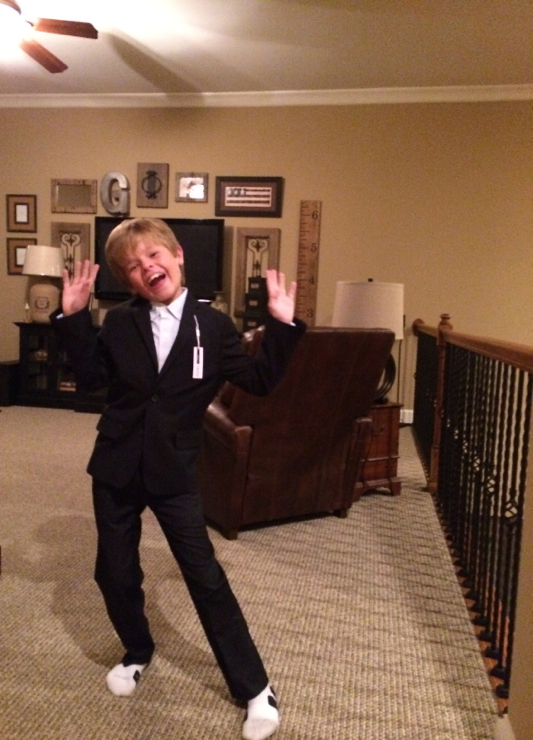 Jack modeling his new suit for the wedding... and showing off his dance moves